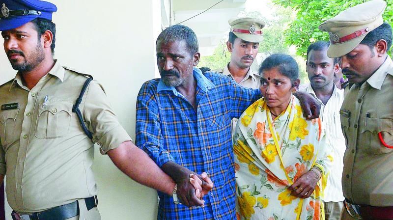 Katta Venugopal alias Khal Nayak and wife K. Lakshmi being taken before mediapersons at Suryaraopet PS in Vijayawada on Saturday. (Photo: DC) Katta Venugopal alias Khal Nayak and wife K. Lakshmi being taken before mediapersons at Suryaraopet PS in Vijayawada on Saturday. (Photo: DC)
