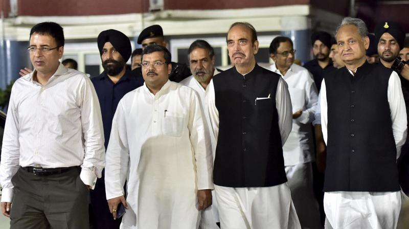 Congress leaders P Chidambaram, Ashok Gehlot, Ghulam Nabi Azad, Mukul Wasnik and Anand Sharma coming out of the Election Commission of India, in New Delhi on Tuesday. A delegation of senior Congress leaders met the election commission over RS polls in Gujarat. (Photo: PTI) Congress leaders P Chidambaram, Ashok Gehlot, Ghulam Nabi Azad, Mukul Wasnik and Anand Sharma coming out of the Election Commission of India, in New Delhi on Tuesday. A delegation of senior Congress leaders met the election commission over RS polls in Gujarat. (Photo: PTI)
