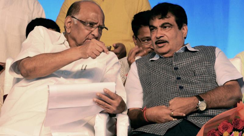 Union Minister for Road Transport and Shipping Nitin Gadkari with NCP chief Sharad Pawar at the foundation stone laying ceremony of a project of National Highways Authority in Pune. (Photo: PTI) Union Minister for Road Transport and Shipping Nitin Gadkari with NCP chief Sharad Pawar at the foundation stone laying ceremony of a project of National Highways Authority in Pune. (Photo: PTI)