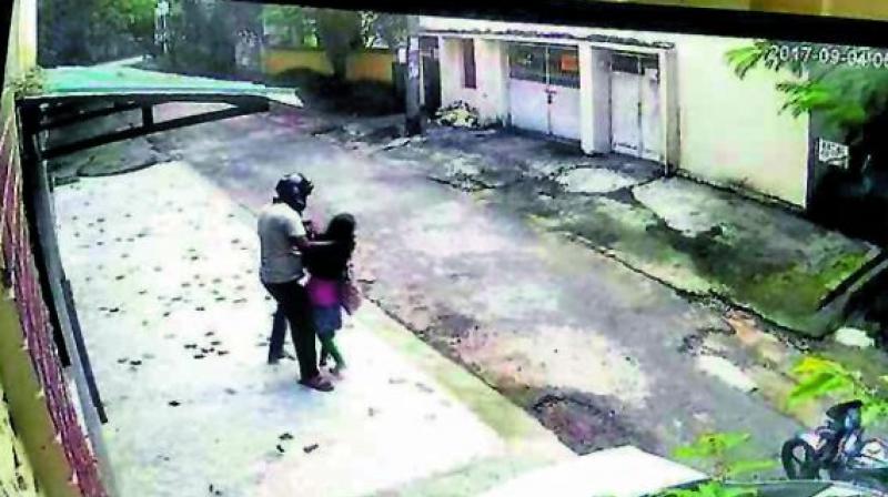 CCTV image shows the girl fighting with the accused. CCTV image shows the girl fighting with the accused.