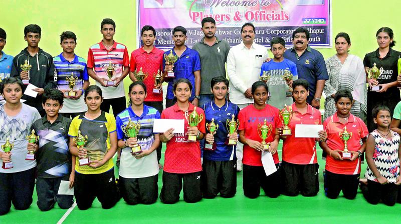Winners and runners-up pose with the trophies after the conclusion of the 3rd Telangana State Sub-Junior (boys & girls) Badminton Championship that was played at the Sri Fit Pro Badminton House in Serlingampally. Winners and runners-up pose with the trophies after the conclusion of the 3rd Telangana State Sub-Junior (boys & girls) Badminton Championship that was played at the Sri Fit Pro Badminton House in Serlingampally.