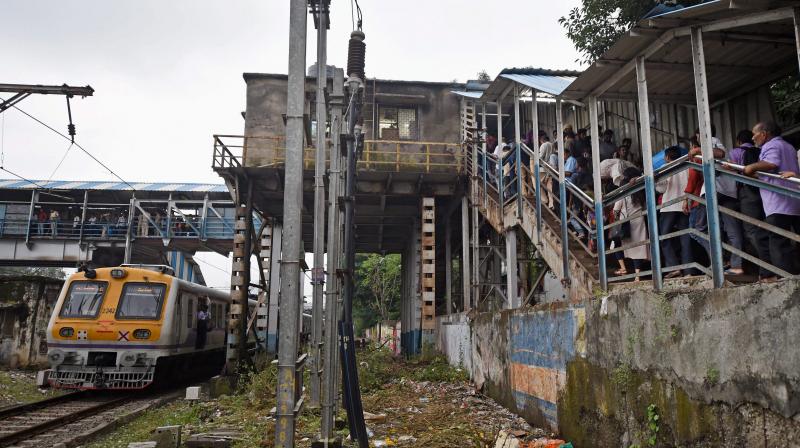 A view of the Elphinstone railway station's foot over bridge where a stampede took place, in Mumbai on Friday. (Photo: PTI) A view of the Elphinstone railway station's foot over bridge where a stampede took place, in Mumbai on Friday. (Photo: PTI)
