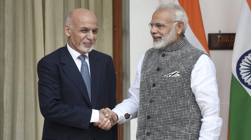 PM Narendra Modi with Afghan President Ashraf Ghani. (Photo: ANI) PM Narendra Modi with Afghan President Ashraf Ghani. (Photo: ANI)