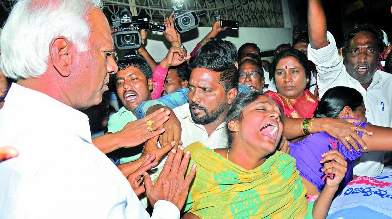 Deputy Chief Minister and education minister Kadiam Srihari consoles Mounika, daughter of MRPS activist Bharti, at the Osmania Hospital on Monday. (Photo: DC) Deputy Chief Minister and education minister Kadiam Srihari consoles Mounika, daughter of MRPS activist Bharti, at the Osmania Hospital on Monday. (Photo: DC)