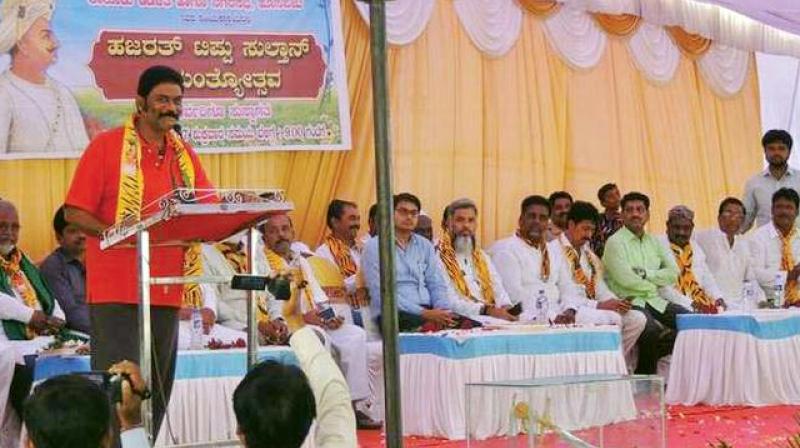 BJP MLA Anand Singh speaks at Tipu Jayanti celebrations in his home constituency at Hosapete on Friday. BJP MLA Anand Singh speaks at Tipu Jayanti celebrations in his home constituency at Hosapete on Friday.