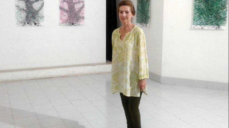 Constance Fulda with her tree paintings at Kerala Lilithakala Akademi, Thrissur. (Photo: DC) Constance Fulda with her tree paintings at Kerala Lilithakala Akademi, Thrissur. (Photo: DC)