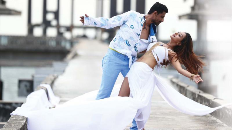A scene from Nanjundi Kalyana starring Thanush Shivanna and Shravya. A scene from Nanjundi Kalyana starring Thanush Shivanna and Shravya.