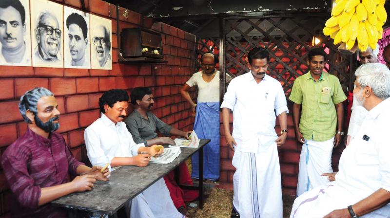 CPM Thrissur district secretary K. Radhakrishnan visits the replica of a village tea stall at Thekkinkkad Maidan. Chalakkudy MLA B.D. Devassy is also seen. (Photo: Anup K. Venu) CPM Thrissur district secretary K. Radhakrishnan visits the replica of a village tea stall at Thekkinkkad Maidan. Chalakkudy MLA B.D. Devassy is also seen. (Photo: Anup K. Venu)