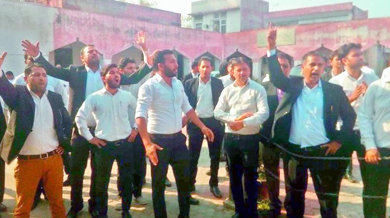 Lawyers protesting against filing of chargesheet in the Kathua rape and murder case. (Photo: Agencies) Lawyers protesting against filing of chargesheet in the Kathua rape and murder case. (Photo: Agencies)