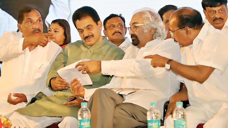 Former adviser to Prime Minister of India, Sam Pitroda (2nd R), with senior Congress leaders Veerappa Moily and K.C. Venugopal, and Bengaluru Development Minister K.J. George at the release of Congress party manifesto in Bengaluru on Saturday. (Photo: DC) Former adviser to Prime Minister of India, Sam Pitroda (2nd R), with senior Congress leaders Veerappa Moily and K.C. Venugopal, and Bengaluru Development Minister K.J. George at the release of Congress party manifesto in Bengaluru on Saturday. (Photo: DC)