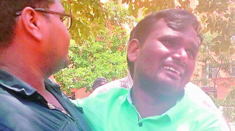 An inconsolable Rajesham after the incident. An inconsolable Rajesham after the incident.