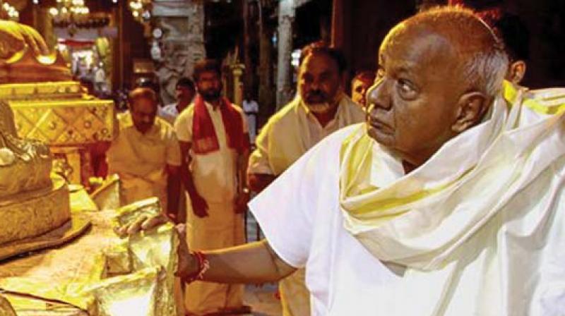 JD(S) leader Deve Gowda at Tirupati temple on Friday. JD(S) leader Deve Gowda at Tirupati temple on Friday.
