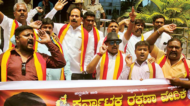 Members of the Karnataka Rakshana Vedike stage a protest at Karnataka Film Chamber in Bengaluru on Saturday against the release of Kaala. (Photo: DC) Members of the Karnataka Rakshana Vedike stage a protest at Karnataka Film Chamber in Bengaluru on Saturday against the release of Kaala. (Photo: DC)