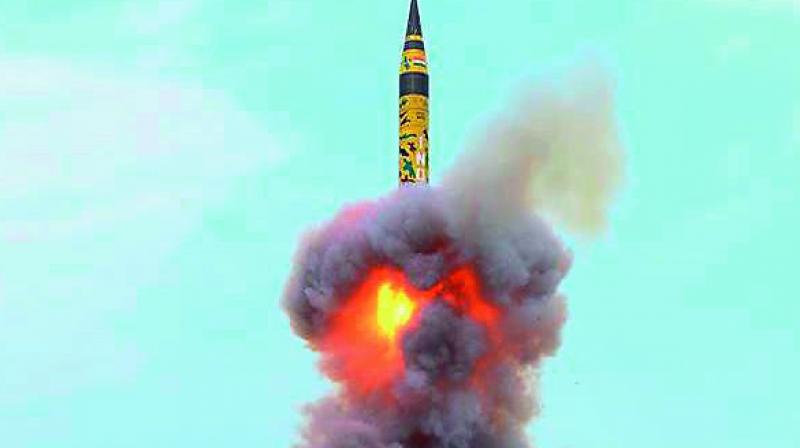 Agni-5 lifts off during a successful test-fire from a mobile launch pad in Odisha on Sunday. (Photo: PTI) Agni-5 lifts off during a successful test-fire from a mobile launch pad in Odisha on Sunday. (Photo: PTI)
