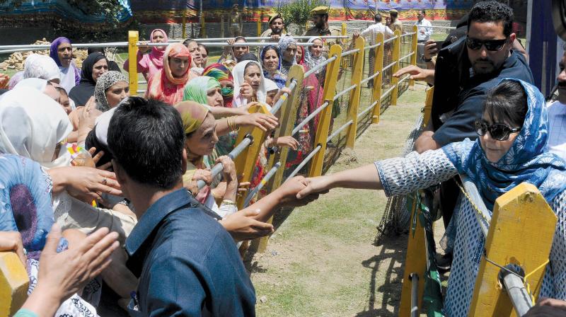 J&K CM Mehbooba Mufti interacts with her supporters at a rally, in Srinagar on Sunday. (Photo: PTI) J&K CM Mehbooba Mufti interacts with her supporters at a rally, in Srinagar on Sunday. (Photo: PTI)