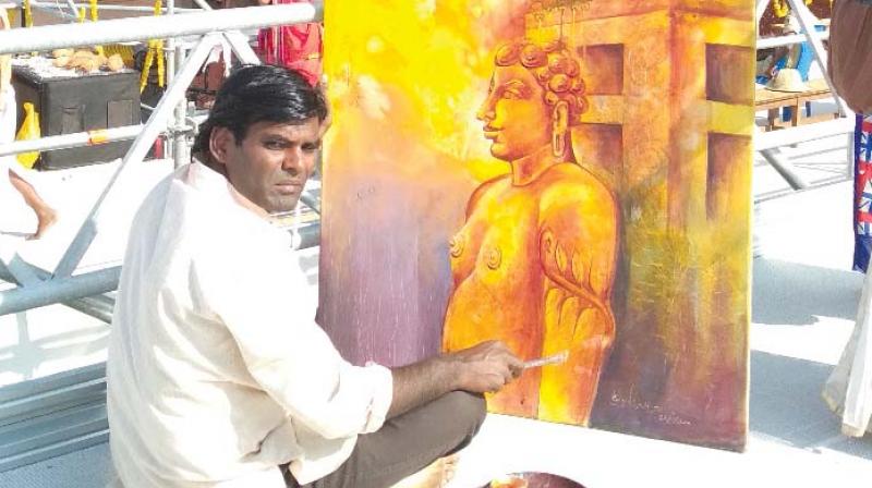 Kotegadde Ravi paints at the Shravanabelagola. Kotegadde Ravi paints at the Shravanabelagola.