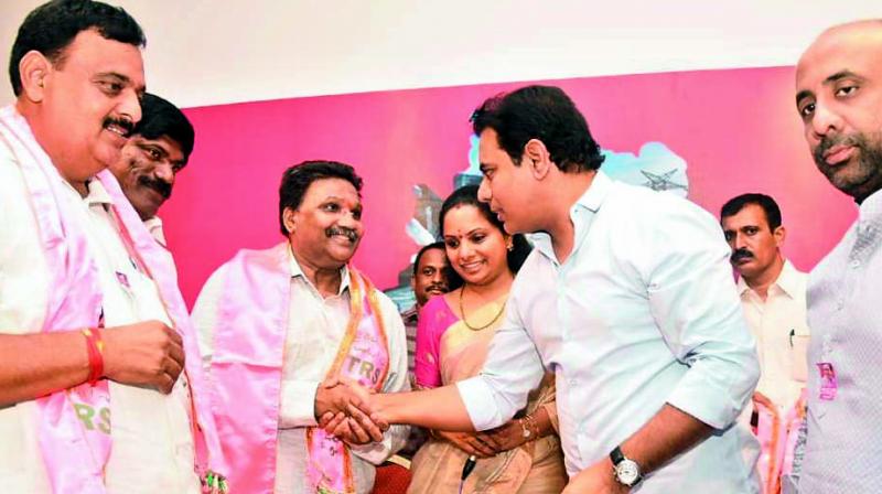 TD Telangana state rice millers’ association general secretary Vaddi Mohan Reddy and Gampa Nagendar and their followers joined the TRS at Telangana Bhavan in the presence of minister K.T. Rama Rao and Nizamabad MP Kalvakuntla Kavitha on Monday. (Photo:DC) TD Telangana state rice millers’ association general secretary Vaddi Mohan Reddy and Gampa Nagendar and their followers joined the TRS at Telangana Bhavan in the presence of minister K.T. Rama Rao and Nizamabad MP Kalvakuntla Kavitha on Monday. (Photo:DC)