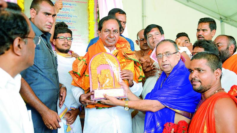 Chief Minister K. Chandrasekhar Rao being felicitated at a function organised to lay foundation stone for thte Gattu Lift Irrigation Project in Gadwal on Friday. (Photo: DC) Chief Minister K. Chandrasekhar Rao being felicitated at a function organised to lay foundation stone for thte Gattu Lift Irrigation Project in Gadwal on Friday. (Photo: DC)