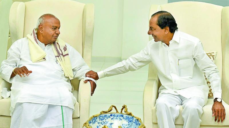 Former prime minister H.D. Deve Gowda meets Telangana state Chief Minister K. Chandrasekhar Rao, in Hyderabad on Sunday. Former prime minister H.D. Deve Gowda meets Telangana state Chief Minister K. Chandrasekhar Rao, in Hyderabad on Sunday.