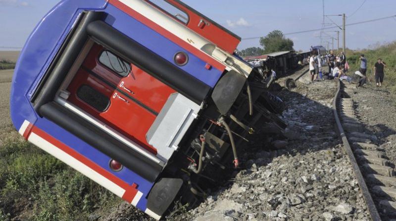 An overturned train car is seen near a village at Tekirdag province. (Photo: AP) An overturned train car is seen near a village at Tekirdag province. (Photo: AP)