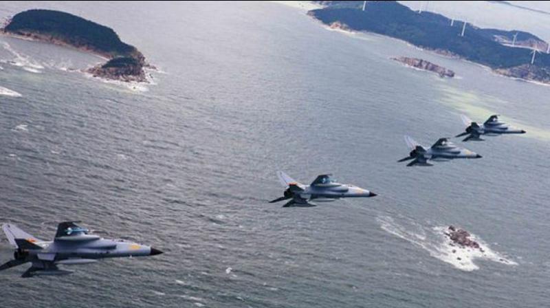 The Pentagon said on Wednesday the heavy bombers had taken part in a combined operation with Japan over the East China Sea and had flown through international airspace over the South China Sea a day before. (Representational Image) The Pentagon said on Wednesday the heavy bombers had taken part in a combined operation with Japan over the East China Sea and had flown through international airspace over the South China Sea a day before. (Representational Image)