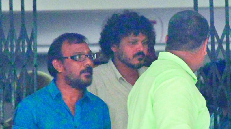 Cameraman Shyam K. Naidu enters the excise department’s office after he was summoned for questioning. Cameraman Shyam K. Naidu enters the excise department’s office after he was summoned for questioning.