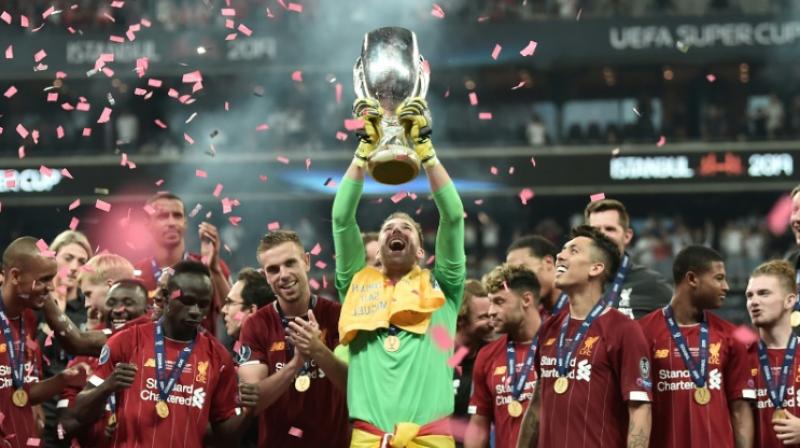 Adrian raises aloft the UEFA Super Cup after his save in the penalty shoot-out allowed Liverpool to beat Chelsea in Istanbul. (Photo:AFP) Adrian raises aloft the UEFA Super Cup after his save in the penalty shoot-out allowed Liverpool to beat Chelsea in Istanbul. (Photo:AFP)