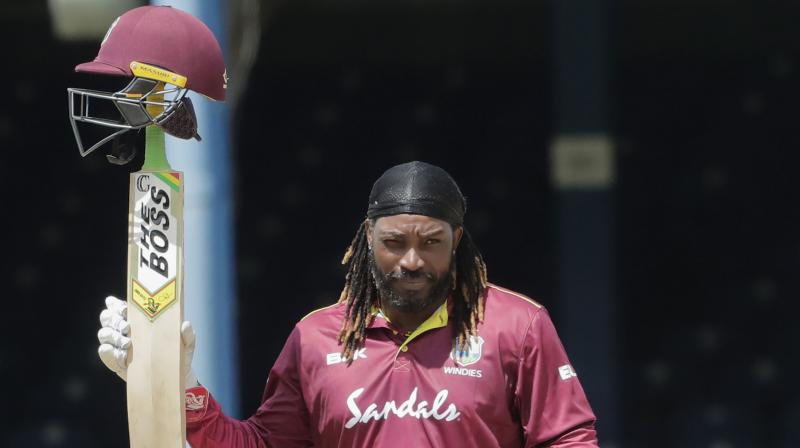 Indian captain Virat Kohli paid tribute to veteran West Indies batsman Chris Gayle, who appeared to have played his last match in the third ODI here, saying apart from his cricketing exploits he will also be remembered for his fun-loving and friendly nature. (Photo:AP) Indian captain Virat Kohli paid tribute to veteran West Indies batsman Chris Gayle, who appeared to have played his last match in the third ODI here, saying apart from his cricketing exploits he will also be remembered for his fun-loving and friendly nature. (Photo:AP)