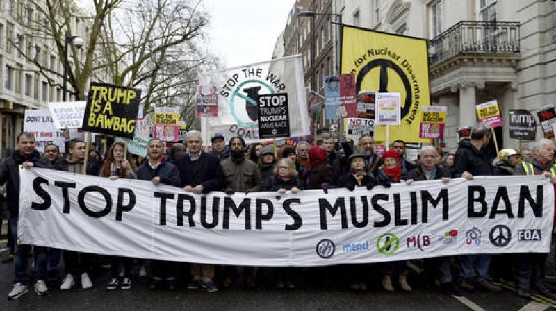 Protesters on the street against President Donald Trump's travel restriction from seven Muslim-majority countries. (Photo: AP) Protesters on the street against President Donald Trump's travel restriction from seven Muslim-majority countries. (Photo: AP)