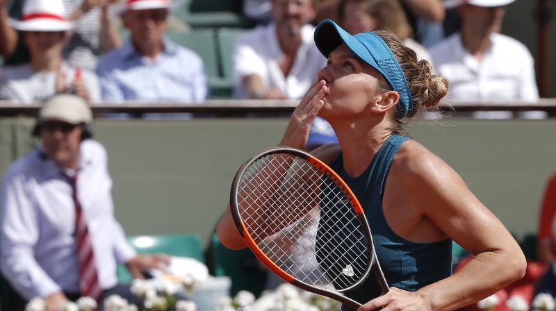 Simone Halep's victory over third seed Muguruza also means she will retain the world number one ranking next week. (Photo: AP)) Simone Halep's victory over third seed Muguruza also means she will retain the world number one ranking next week. (Photo: AP))