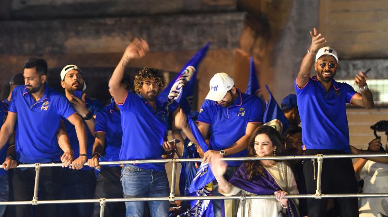 The mercurial Hardik Pandya (right) celebrates with Mumbai Indians teammates last years IPL triumph but does he have the cool to be the team finisher? (AFP)