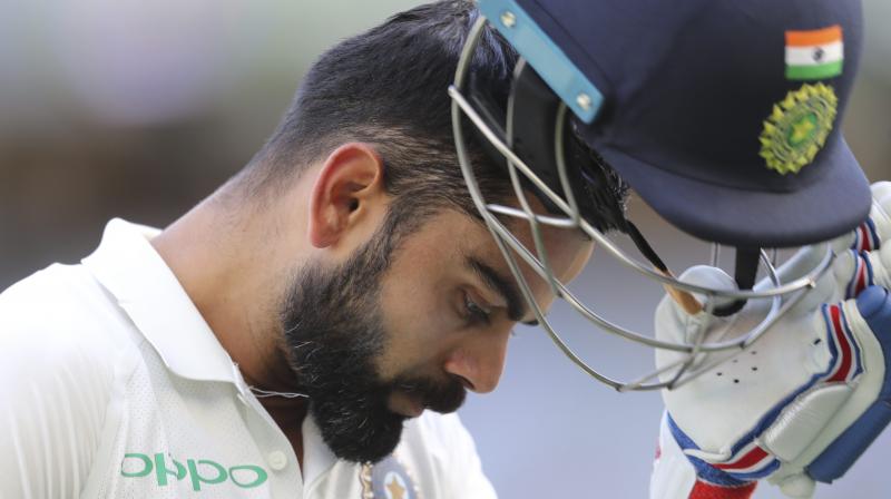"Kohli has to go a long way. It is not right to talk about him in the middle of his career," said Dev. (Photo: AP) "Kohli has to go a long way. It is not right to talk about him in the middle of his career," said Dev. (Photo: AP)