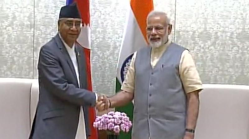 Prime Minister Narendra Modi and his Nepalese counterpart Sher Bahadur Deuba will review the entire gamut of bilateral ties on Thursday. (Photo: ANI/Twitter) Prime Minister Narendra Modi and his Nepalese counterpart Sher Bahadur Deuba will review the entire gamut of bilateral ties on Thursday. (Photo: ANI/Twitter)