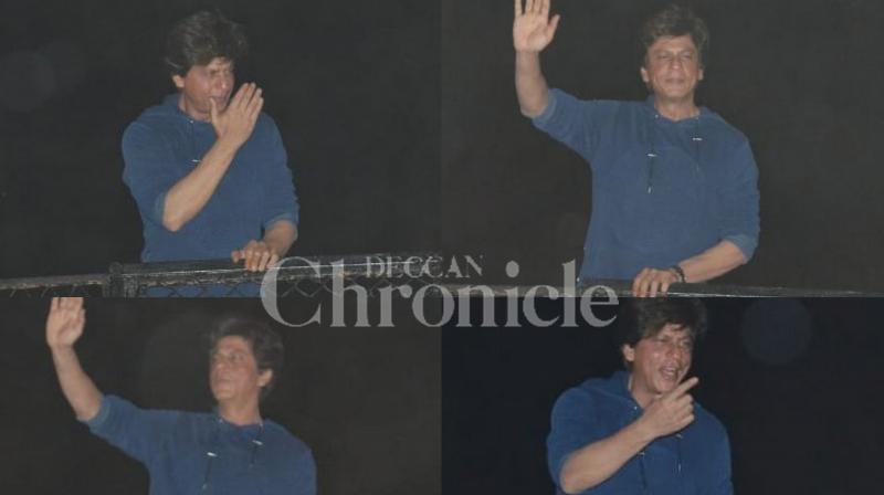 Bollywood superstar Shah Rukh Khan who turned 53 on Friday, greeted thousands of his fans outside his residence at midnight and thanked them for their wishes. (Photos: Viral Bhayani) Bollywood superstar Shah Rukh Khan who turned 53 on Friday, greeted thousands of his fans outside his residence at midnight and thanked them for their wishes. (Photos: Viral Bhayani)