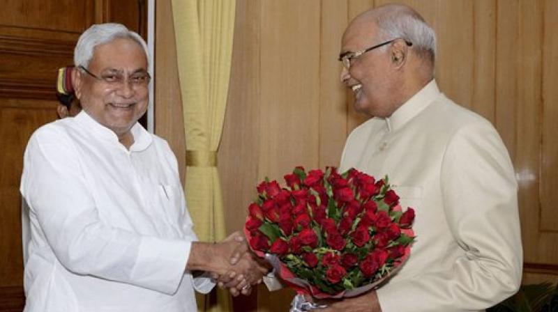Bihar Chief Minister Nitish Kumar greets Governor Ram Nath Kovind on being announced as NDA’s presidential candidate, in Patna on Monday. (Photo: PTI) Bihar Chief Minister Nitish Kumar greets Governor Ram Nath Kovind on being announced as NDA’s presidential candidate, in Patna on Monday. (Photo: PTI)