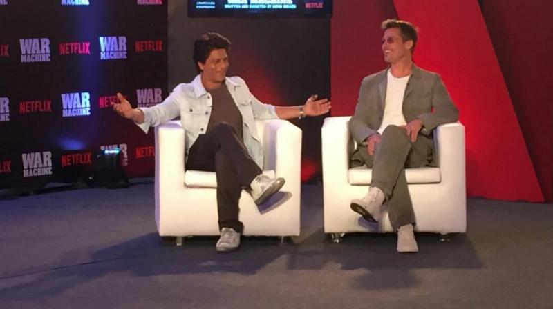 Shah Rukh Khan in a chat session with Brad Pitt. (Pic: Twitter) Shah Rukh Khan in a chat session with Brad Pitt. (Pic: Twitter)