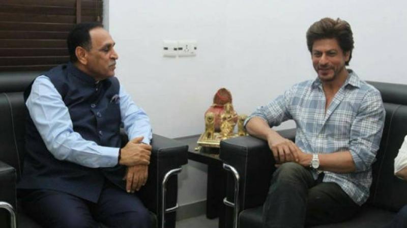 Shah Rukh Khan meets CM Vijay Rupani of Gujarat. (Pic: Instagram/king_srkian) Shah Rukh Khan meets CM Vijay Rupani of Gujarat. (Pic: Instagram/king_srkian)