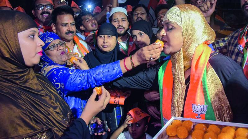Muslim women celebrate after the Triple Talaq Bill was passed in the Rajya Sabha, in Varanasi, on Tuesday. (Photo: PTI) Muslim women celebrate after the Triple Talaq Bill was passed in the Rajya Sabha, in Varanasi, on Tuesday. (Photo: PTI)
