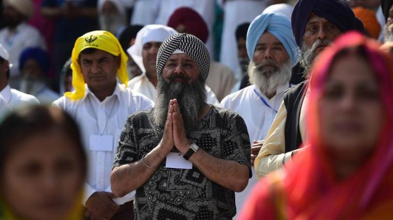 Islamabad said it felt “honoured” that the “celebrations of the 550th birth anniversary of Baba Guru Nanak by Indian Sikhs are being started from Nankana Sahib, Pakistan. (Photo: Representational Image/AFP) Islamabad said it felt “honoured” that the “celebrations of the 550th birth anniversary of Baba Guru Nanak by Indian Sikhs are being started from Nankana Sahib, Pakistan. (Photo: Representational Image/AFP)