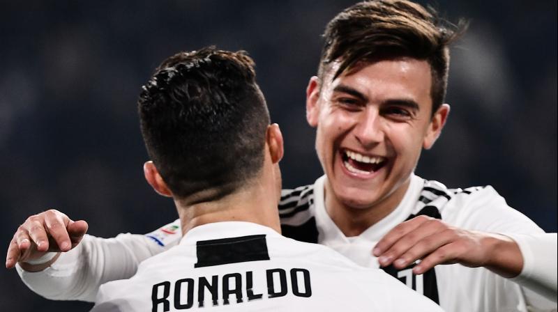 Ronaldo set up Dybala to fire in the first goal after just six minutes in Turin as the Argentina forward, who has been overshadowed since the arrival of the former Real Madrid player, scored his first league goal since November 3. (Photo: AFP) Ronaldo set up Dybala to fire in the first goal after just six minutes in Turin as the Argentina forward, who has been overshadowed since the arrival of the former Real Madrid player, scored his first league goal since November 3. (Photo: AFP)