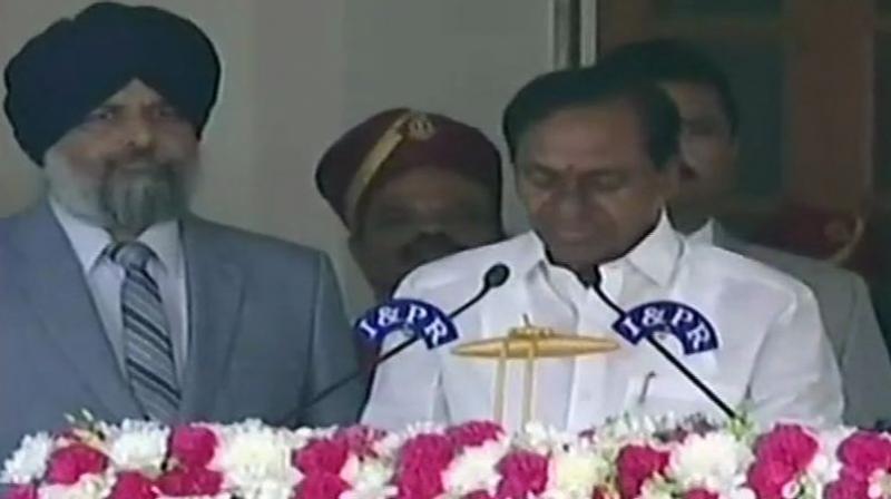 KCR was sworn in as the chief minister of the state for the second time after his party, Telangana Rashtra Samithi (TRS), won 88 of 119 Assembly seats in the December 7 election. (Photo: ANI) KCR was sworn in as the chief minister of the state for the second time after his party, Telangana Rashtra Samithi (TRS), won 88 of 119 Assembly seats in the December 7 election. (Photo: ANI)