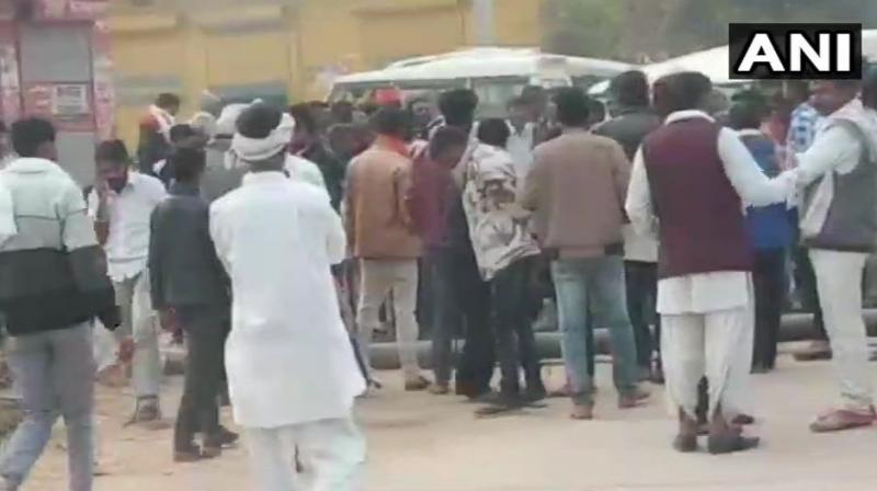 Supporters of Sachin Pilot block road in Karauli. (Photo: ANI) Supporters of Sachin Pilot block road in Karauli. (Photo: ANI)