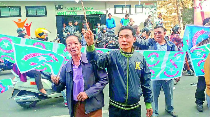 Mizo National Front workers celebrate the party’s victory in the Assembly elections, in Aizawl on Tuesday. — PTI Mizo National Front workers celebrate the party’s victory in the Assembly elections, in Aizawl on Tuesday. — PTI