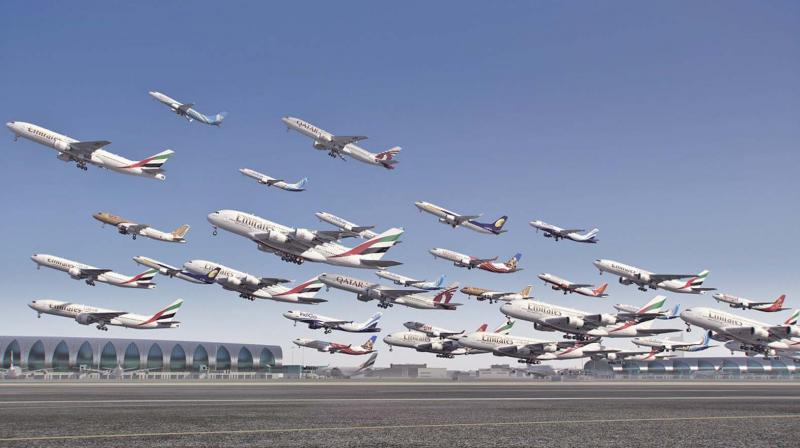 A composite of multiple planes taking off from Dubai airport. A composite of multiple planes taking off from Dubai airport.