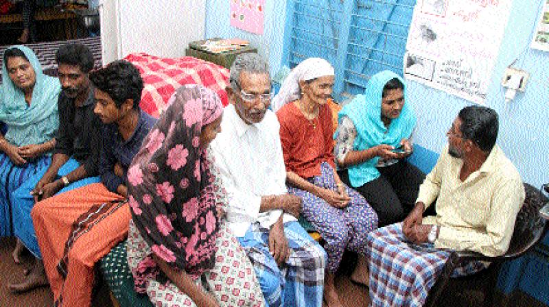Basheer of Rinsha Mansil with wife Shereefa, and family members at a relief camp in Koyilandy, Kozhikode on Sunday. Basheer of Rinsha Mansil with wife Shereefa, and family members at a relief camp in Koyilandy, Kozhikode on Sunday.