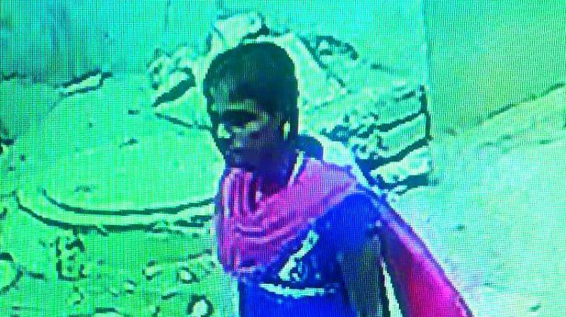 Suspect in case caught on CCTV camera. Suspect in case caught on CCTV camera.