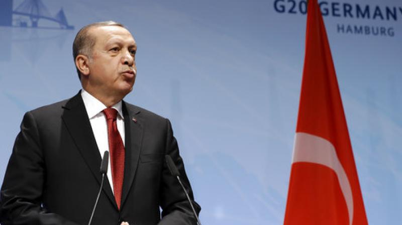 He said former French president Francois Hollande had promised him that Turkey would be classed as a developing and not an industrialised economy -- meaning Ankara would receive money from a global climate fund rather than have to pay into it. (Photo: AP) He said former French president Francois Hollande had promised him that Turkey would be classed as a developing and not an industrialised economy -- meaning Ankara would receive money from a global climate fund rather than have to pay into it. (Photo: AP)