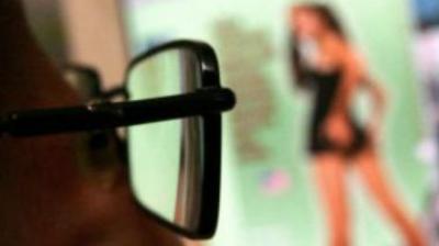 Man rushed to hospital after hacking his penis while watching porn