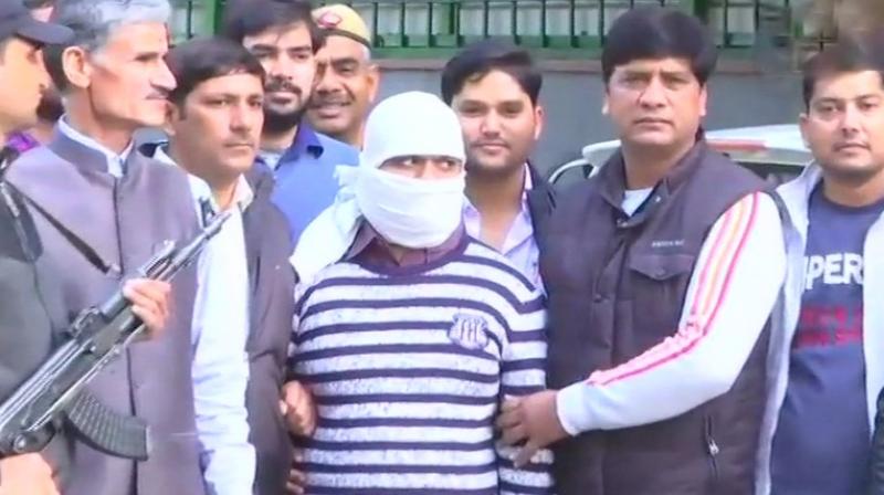 Wanted Indian Mujahideen terrorist Ariz Khan was arrested by the Special Cell of Delhi Police on Wednesday. (Photo: ANI | Twitter) Wanted Indian Mujahideen terrorist Ariz Khan was arrested by the Special Cell of Delhi Police on Wednesday. (Photo: ANI | Twitter)