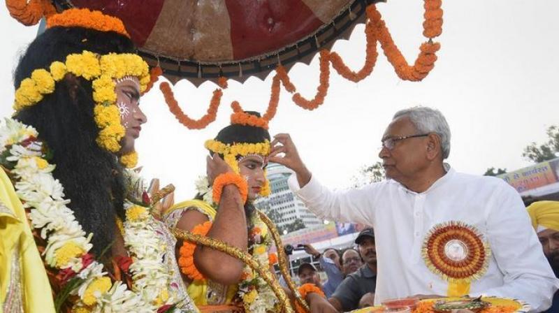 Nevertheless, the chief minister – flanked by senior political figures like assembly Speaker Vijay Kumar Chaudhary and state Congress president and MLC Madan Mohan Jha – took to the dais erected for the festivities at the assigned hour and kicked off the ceremony by lighting lamps (Photo: PTI) Nevertheless, the chief minister – flanked by senior political figures like assembly Speaker Vijay Kumar Chaudhary and state Congress president and MLC Madan Mohan Jha – took to the dais erected for the festivities at the assigned hour and kicked off the ceremony by lighting lamps (Photo: PTI)